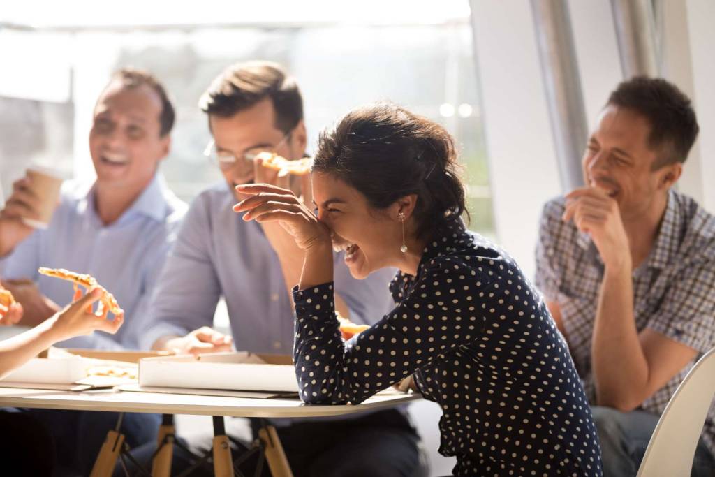 A photo of a team working together and having fun