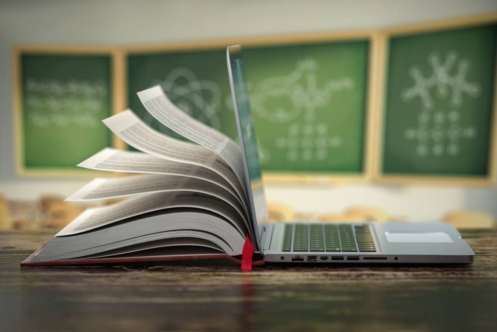 E-learning online education or internet encyclopedia concept. Open laptop and book compilation in a classroom. 3d illustration.