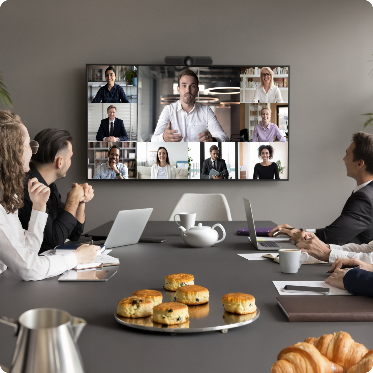 Corporate guests using Launcher to launch their preferred video conferencing system to have a productive discussion in your modern hotel conference rooms